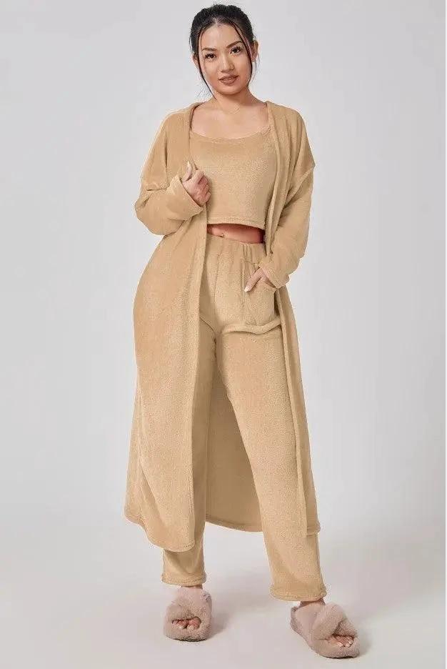 Women's 3-piece cozy lounge set by MANDOTOS, including pajama top, bottoms, and cardigan, soft and comfortable for relaxing.