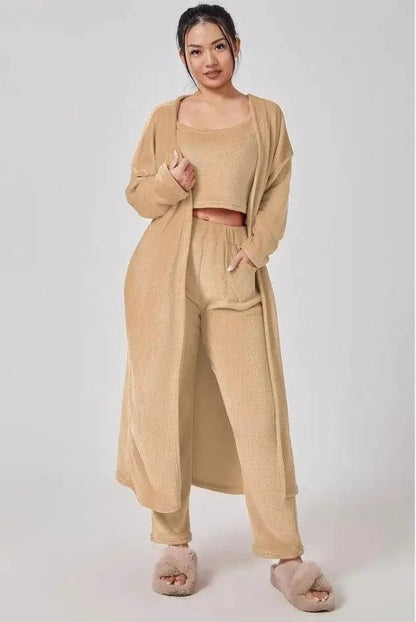 Women's 3-piece cozy lounge set by MANDOTOS, including pajama top, bottoms, and cardigan, soft and comfortable for relaxing.