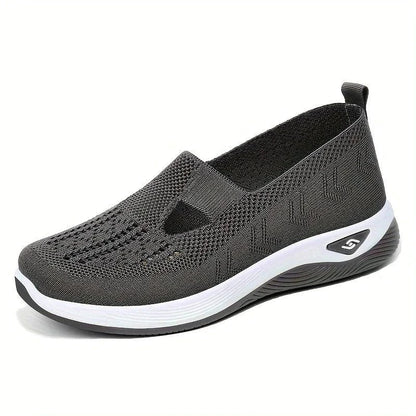Women's airy mesh sneakers by MANDOTOS featuring breathable fabric and white sole, perfect for casual wear and active lifestyles.