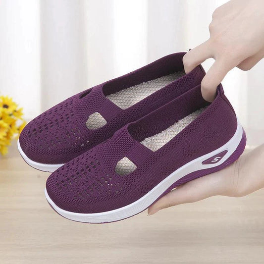 Women's airy mesh sneakers by MANDOTOS featuring breathable fabric and lightweight design for comfortable everyday wear.