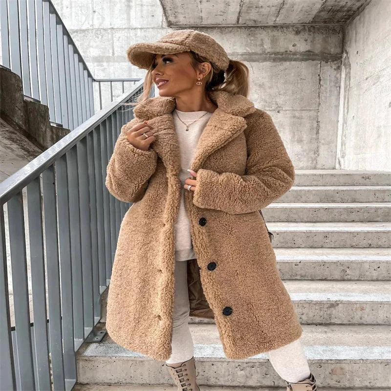 Women's lamb wool coat by MANDOTOS featuring a classic tailored design and cozy, high-quality wool fabric.