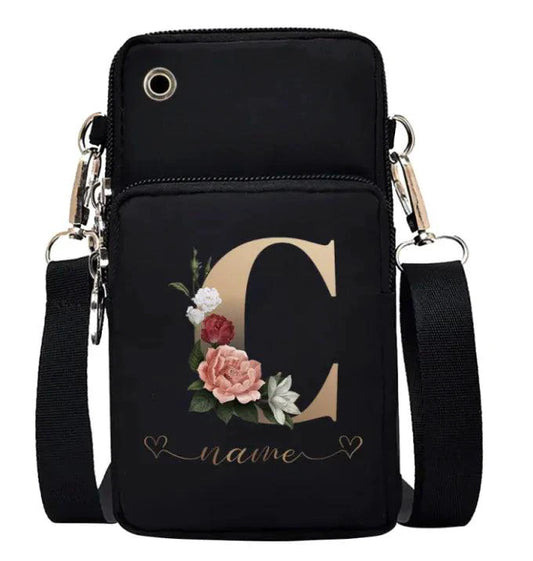 Women's genuine leather handbag by MANDOTOS, showcasing a portable stylish design with top handles and sleek finish.