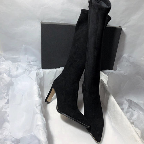 Mandotos women's high heel stretch below-the-knee boots showing sleek design and black leather material.