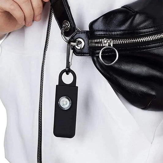 Mandotos women's self-defense safety alarm with keyring and button, compact personal safety device for emergencies.