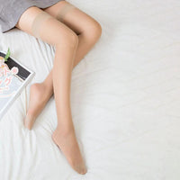 Women's sheer thigh-high socks from MANDOTOS, lightweight summer hosiery with a delicate, transparent design for warm weather.