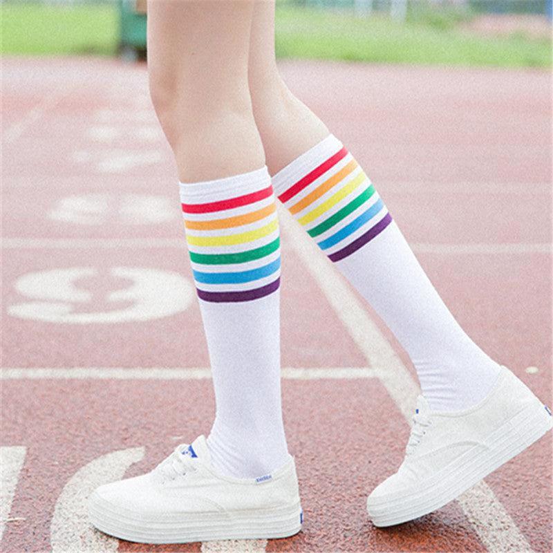 Women's striped knee-high cotton socks by MANDOTOS, featuring colorful horizontal stripes and a soft, comfortable fit.