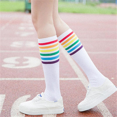 Women's striped knee-high cotton socks by MANDOTOS, featuring colorful horizontal stripes and a soft, comfortable fit.