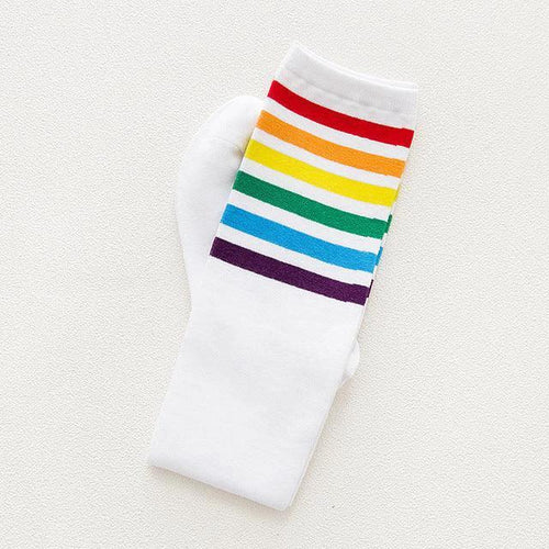 Women's striped knee-high cotton socks by MANDOTOS, featuring colorful horizontal stripes and a cozy, breathable design.