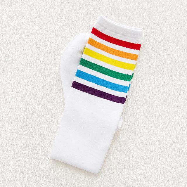 Women's striped knee-high cotton socks by MANDOTOS, featuring colorful horizontal stripes and a cozy, breathable design.