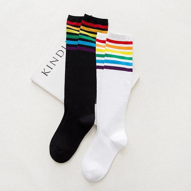 Women's striped knee-high cotton socks by MANDOTOS, featuring colorful horizontal stripes and a comfortable, cozy fit.