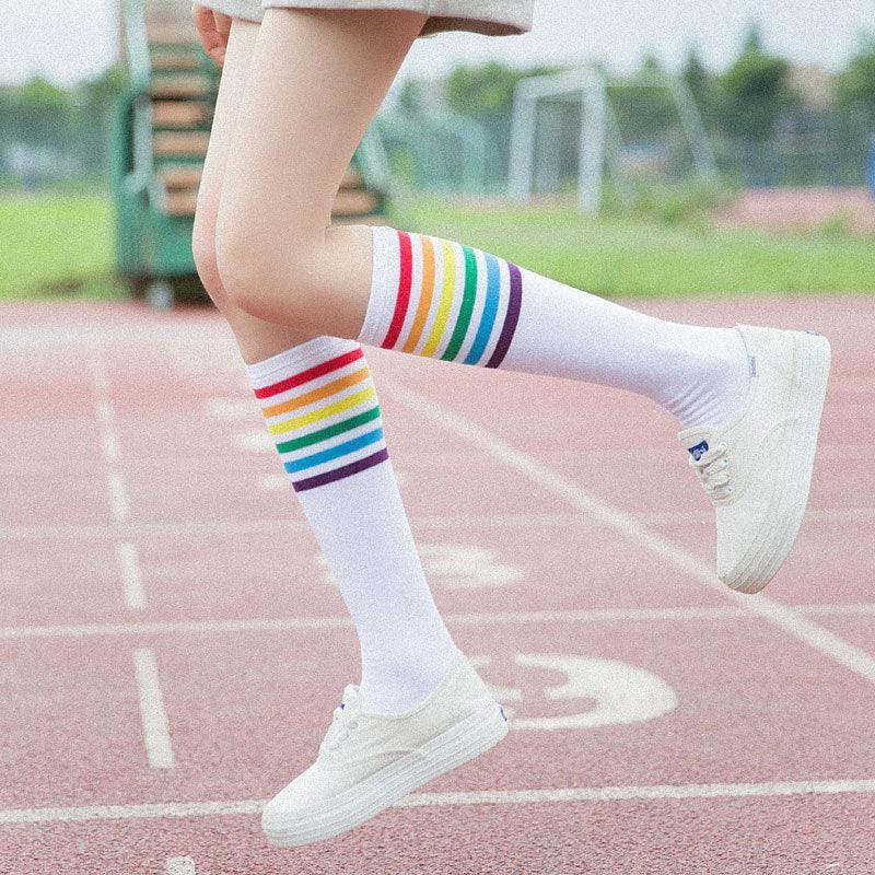 Mandotos women's striped knee-high cotton socks displayed on a white background, showcasing colorful striped design and soft fabric.