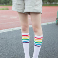 Mandotos women's striped knee-high cotton socks featuring colorful horizontal stripes, soft and comfortable for daily wear.