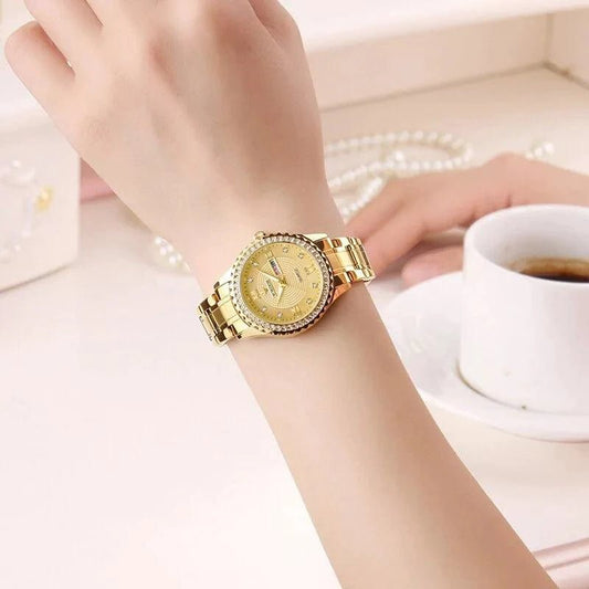 Mandotos WWOOR Elegance gold diamond quartz watch with a sleek design and sparkling accents on the dial.
