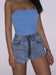 Mandotos Xuan Ya high-waisted denim shorts with hip zipper, showcasing their stylish fit and classic blue denim fabric.