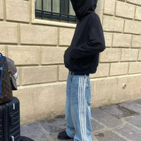 Mandotos Y2K baggy denim jeans with embroidered stripes, wide-leg fit, suitable for streetwear, unisex casual hip-hop style.