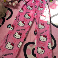 Mandotos Y2K Hello Kitty pajama pants for women featuring cartoon Sanrio anime design, comfortable leisure sleepwear trousers.