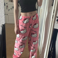 Mandotos Y2K Hello Kitty pajama pants for women featuring cartoon Hello Kitty and Sanrio anime design, comfortable leisure sleepwear.