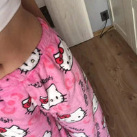 Mandotos Y2K Hello Kitty pajama pants for women, featuring cartoon Hello Kitty design, comfortable sleepwear and leisure trousers.