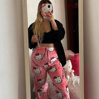 Mandotos Y2K Hello Kitty pajama pants for women featuring cartoon Hello Kitty design, comfortable sleepwear and leisure trousers.