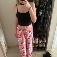 Mandotos Y2K Hello Kitty pajama pants for women featuring cartoon Hello Kitty and Sanrio anime design, comfy leisure sleepwear.