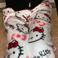 Mandotos Y2K Hello Kitty pajama pants for women featuring cute Sanrio cartoon design, comfortable leisure sleepwear trousers.
