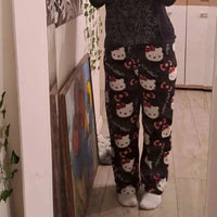 Mandotos Y2K Hello Kitty pajama pants for women featuring cartoon Hello Kitty and Sanrio design, perfect for home sleepwear.