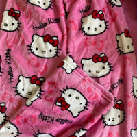 Mandotos Y2K Hello Kitty pajama pants for women featuring cartoon Hello Kitty design, comfortable sleepwear for home and leisure.