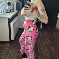 Mandotos Y2K Hello Kitty pajama pants for women featuring cartoon Sanrio anime design, cozy leisure sleepwear trousers.