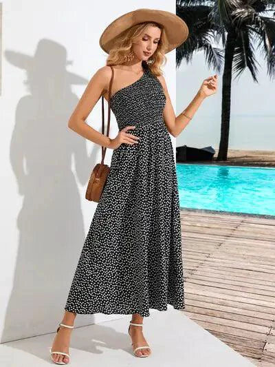 Mandotos Zoe asymmetrical midi dress featuring a flowing design and unique hemline, perfect for stylish occasions.