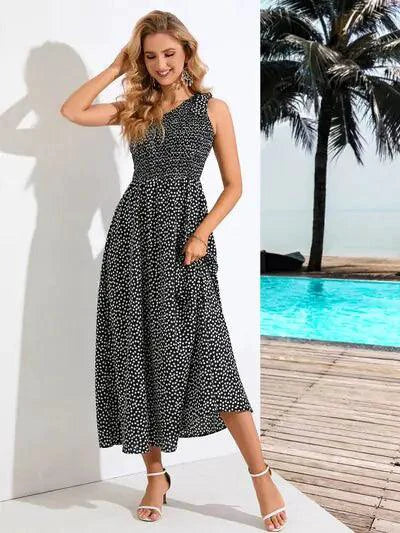 Mandotos Zoe asymmetrical midi dress featuring a flowing silhouette and stylish design in a soft fabric.