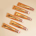 Liquid contour shading pen with sponge head for precise highlighting and shadowing on the face.