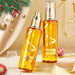 Bottle of Perfume Soft Hair Care Oil, nourishing anti-static spray for frizz-free, hydrated hair, with a sleek packaging design.