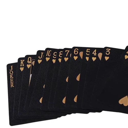 Black and gold waterproof playing cards from Dmagic, featuring a poker suit design, ideal for card games and magic tricks.