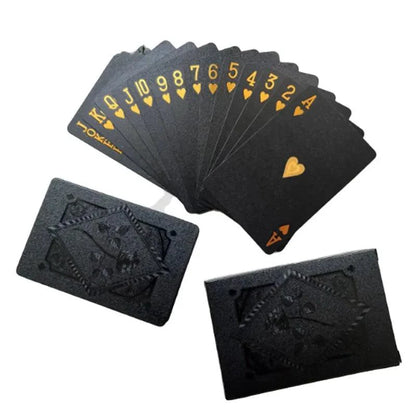 Black and gold waterproof playing card set from Dmagic, featuring poker suits for card games and magic tricks.
