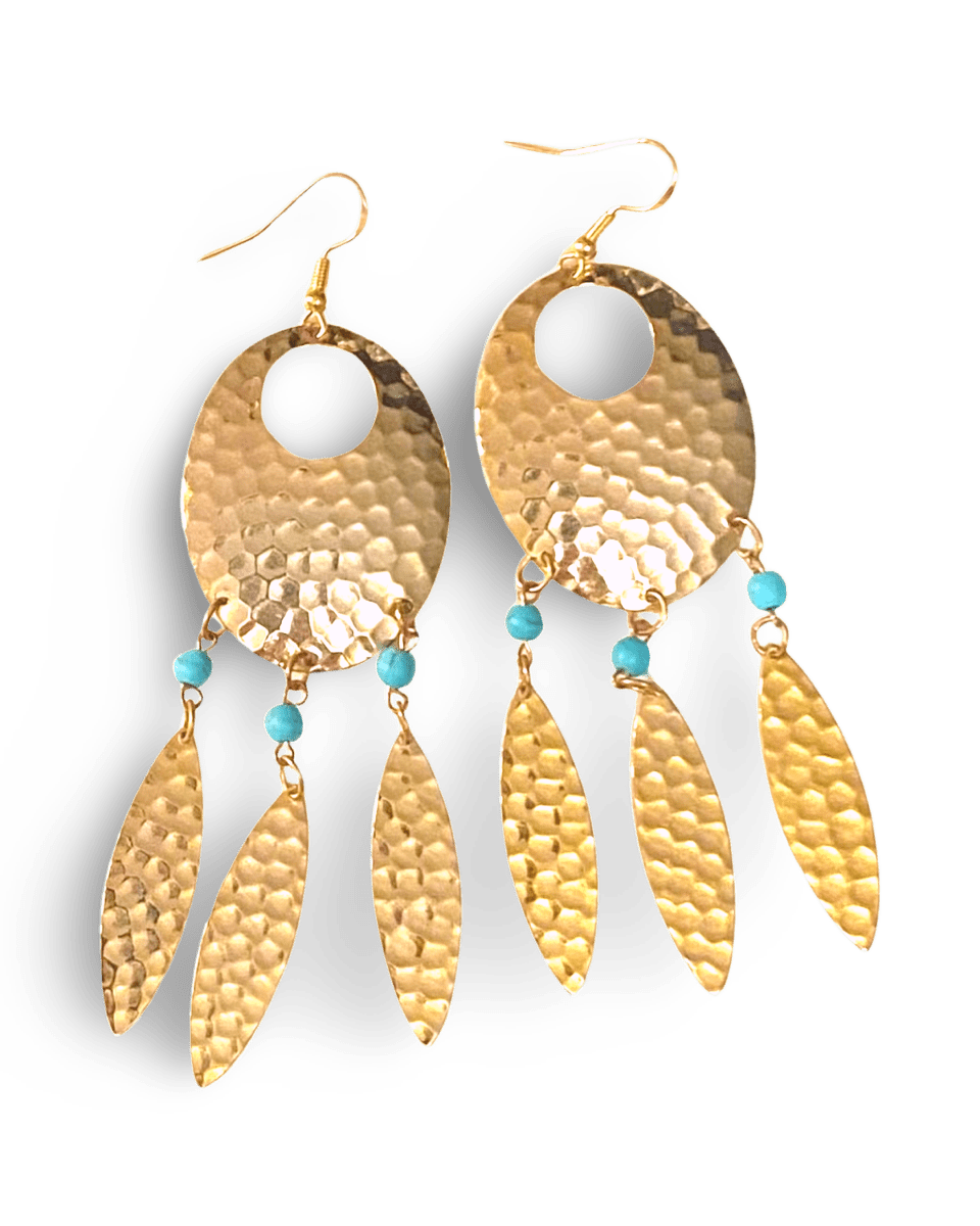 Navette dream catcher earrings by The Urban Charm featuring turquoise accents and feather details, hanging from silver hooks.